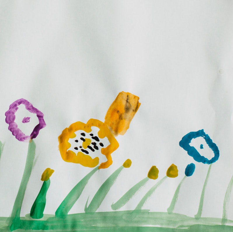 A child’s painting of colourful flowers 